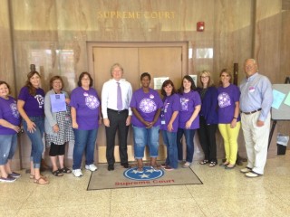 Jackson staff with Justice Page, Judge Brandon Gibson, and Judge John Everett Williams