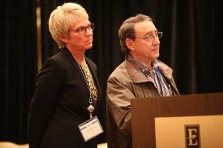 Judge James Hunter and Sumner County Recovery Court Director Tracye Bryant watch a slideshow featuring photos of Judge Hunter after he was named a recipient of the 2019 Making a Difference Award 