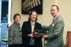 Supreme Court Justice Janice M. Holder and Justice Cornelia A. Clark receive the Advancement of Justice Award from the National Judicial College's Chad Schmucker.